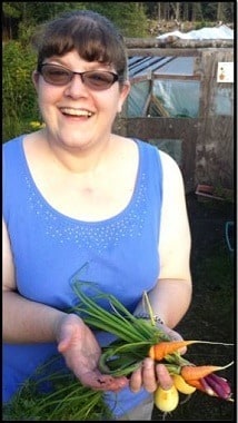 LeAnn Edmondson in her garden - Backdoor Survival