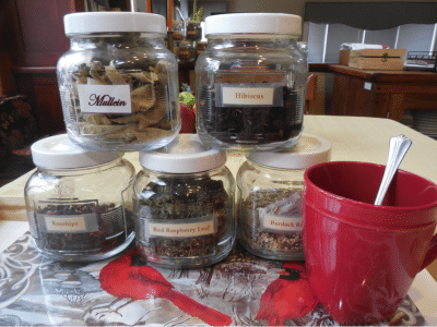 herbal teas stacked in jars