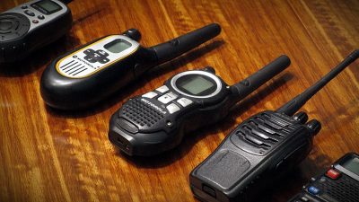 walkie talkie radio on wooden table