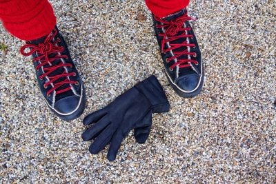 feet glove on floor