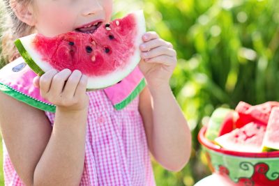 girl eating watermelon summer