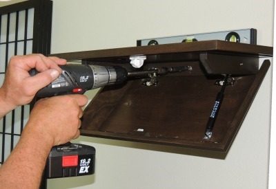 Minutemen-Cabinets-Fastening-in-the-Wall